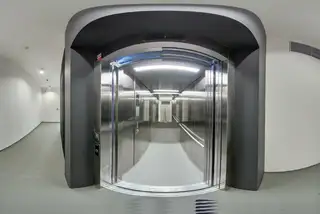 Wide-angle shot of an open elevator.